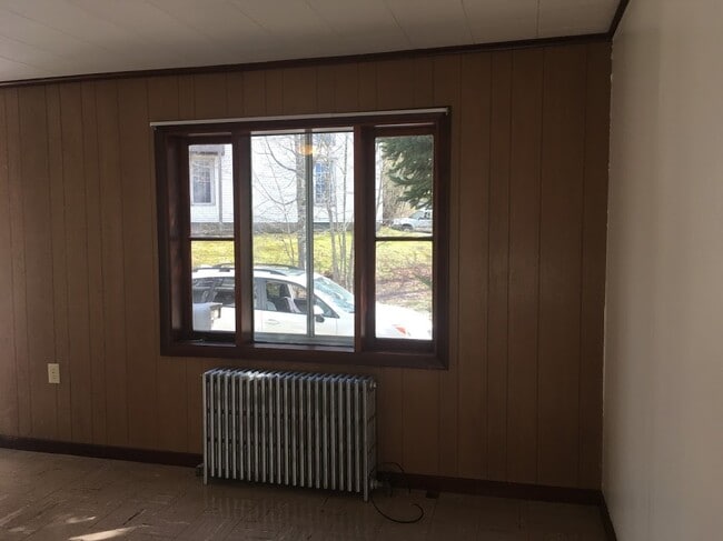 View out Living Room looking toward private parking area. - 16 Obrien Ave Unit 1