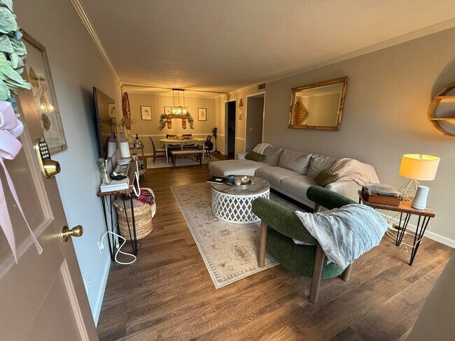 Open-concept living to dining room. (Unit does not come furnished) - 1177 Church St Condo Unit H