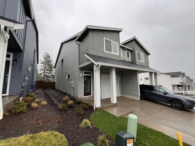 Photo - Exceptional 3-Bedroom Modern Home with Island Kitchen, Spacious Living, and Attached Garage