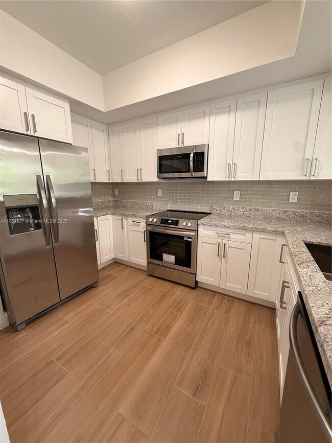 Building Photo - 8826 W Flagler St Rental