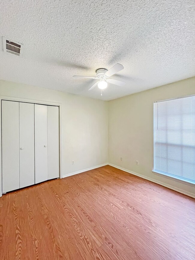 Photo - Spacious 3-Bedroom Duplex with Covered Parking & Fenced Yard!