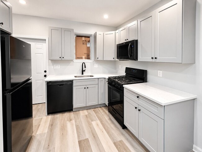 Photo - Spacious 3BR Rental with Central Air & Private Yard