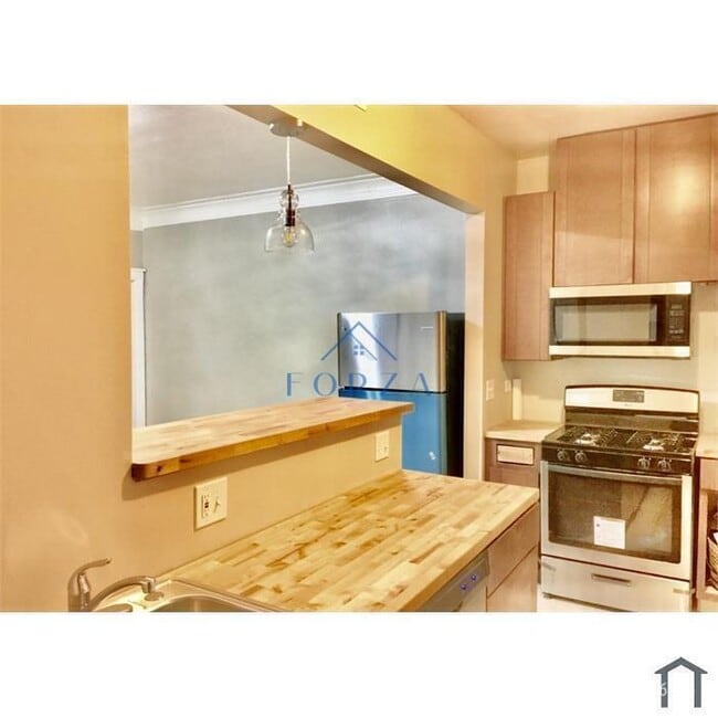 Photo - 4725 S Vincennes Ave Unidad 3S