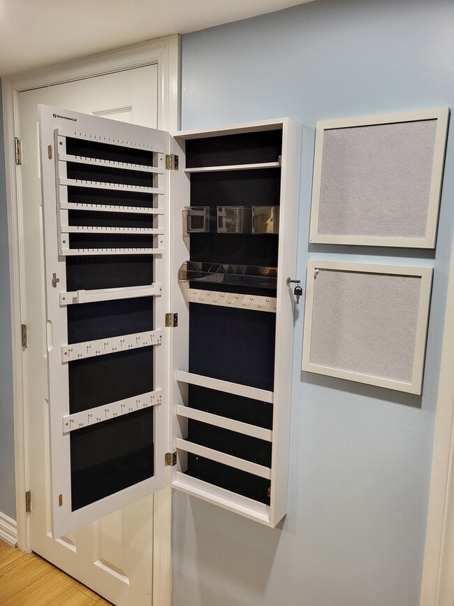 Your very own jewelry organizer and makeup vanity (not shown) make getting ready a breeze! - 1191 Pharmacy Av Unit Basement