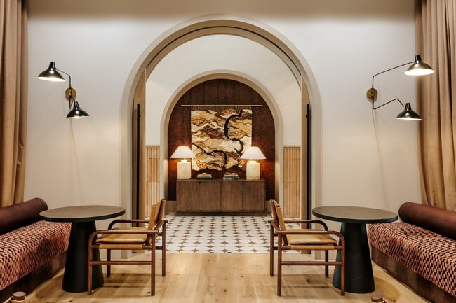 Modern Co-working hub with booth seating at Asher Apartments