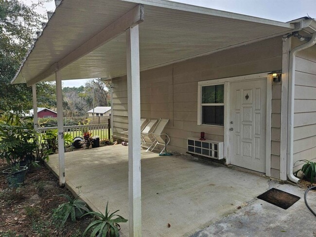 Building Photo - Furnished Studio with Carport & Storage - ... Rental