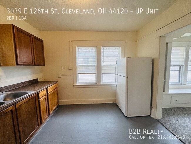 Building Photo - 3039 E 126th St Unit UP