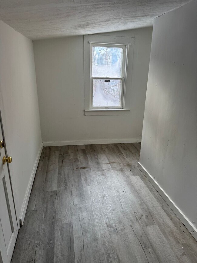 Photo - 2 bedroom 1 bath single family home. Freshly painted with new flooring .