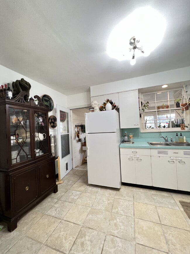 Photo - Charming 3-Bedroom Home with Sunroom Available for Summer 2026 Pre-Lease