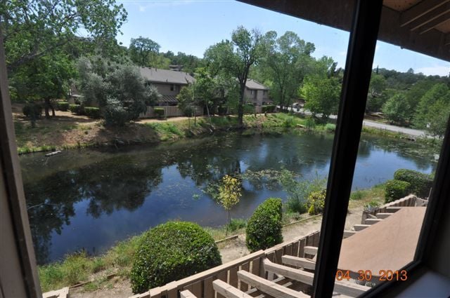 Pond in Back of Townhome. View from Primary Bedroom & outside the private back patio area. - 13059 Lincoln Way Unit # E