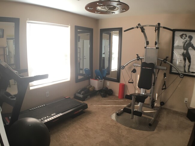 Just because you're away from home or on an extended business stay doesn't mean you have to sacrifice your workout! This room can be configured as the SECOND BEDROOM or WORKOUT ROOM, depending on your preference! - 68820 Risueno Road House