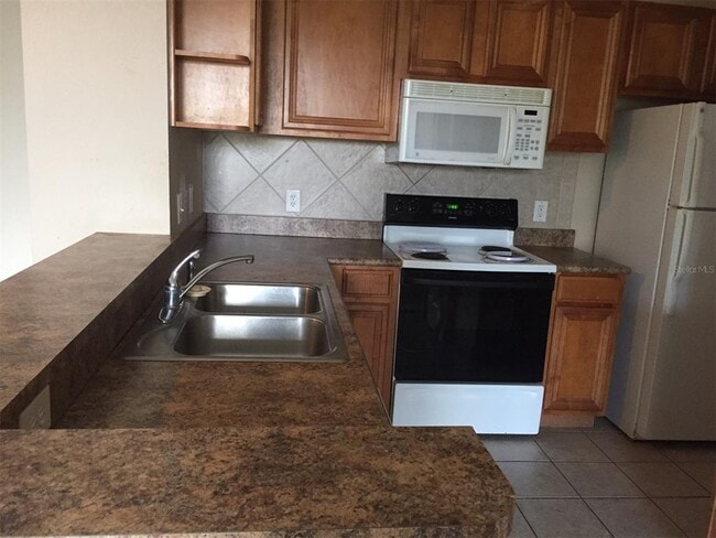 Photo - 5572 Metrowest Blvd Unit 5-209