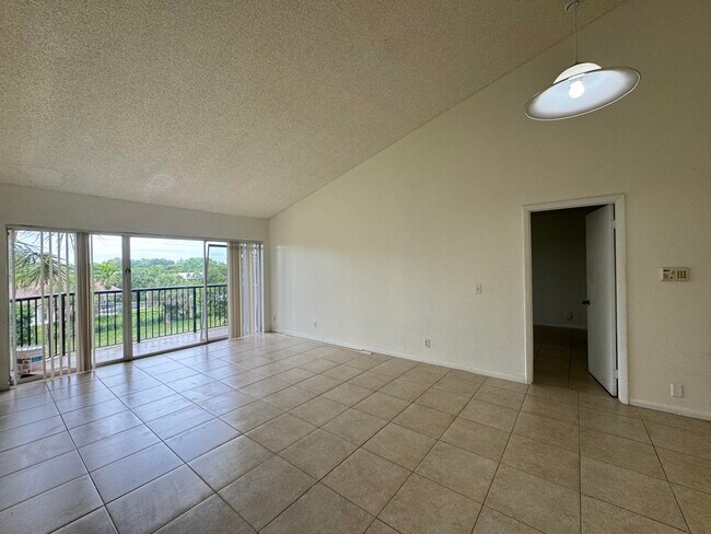 Photo - 8891 Wiles Rd Unit 303