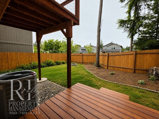 Photo - Spacious 3-Story Home with Flexible Living Space, Heat Pump & Private Deck Retreat