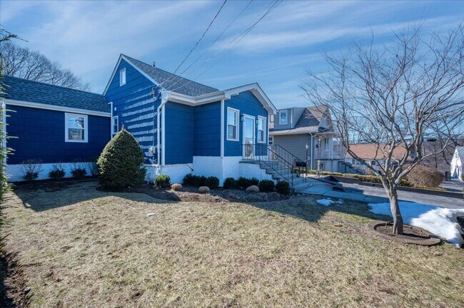 Photo - Beautifully Renovated Contemporary Cape with Private Backyard