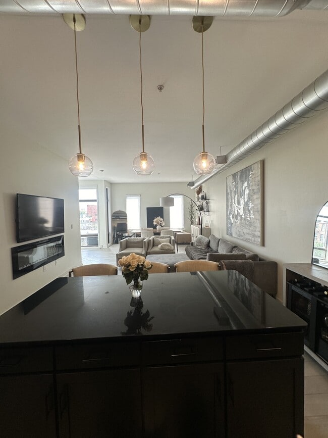 Open kitchen, living, and dining area - 119 4th St Unit 408