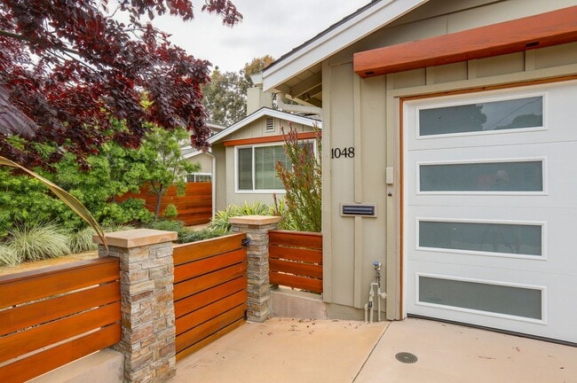 Photo - 4BR/3.5BA Belmont Home with Multiple Ensuite Bedrooms, A/C & 2-Car Garage | YouTube Tour