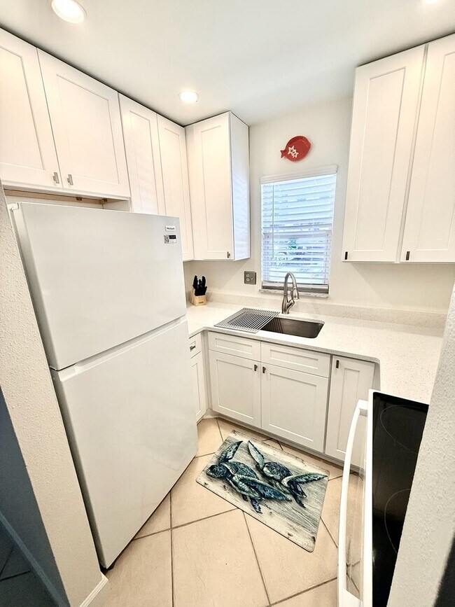 Photo - New throughout and on the Beach! Sea Villas +55 Community Unit C4 - TARPON 1205 #C4
