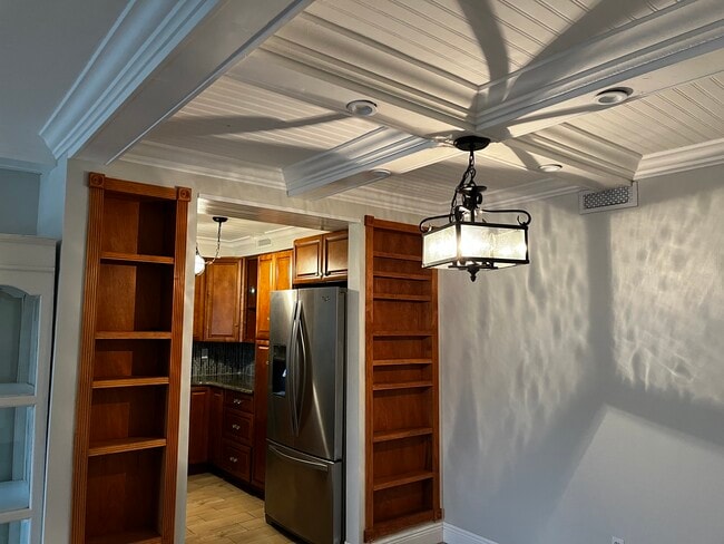 View from dining area, built in shelves, tray ceilings - 1224 S Peninsula Dr Unit 408