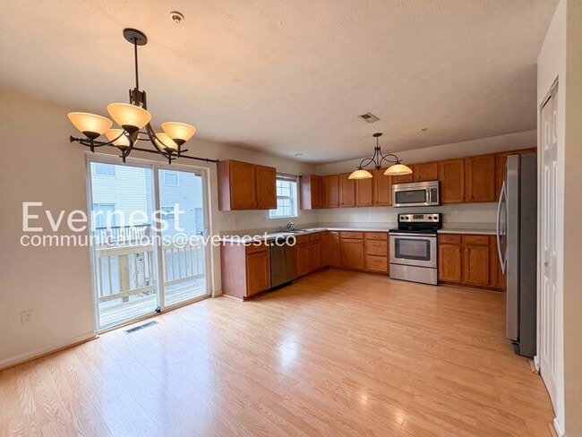 Photo - 3 Bed/2 Bath Townhome with Garage / Pet-Friendly / Vouchers Accepted / Available Now!