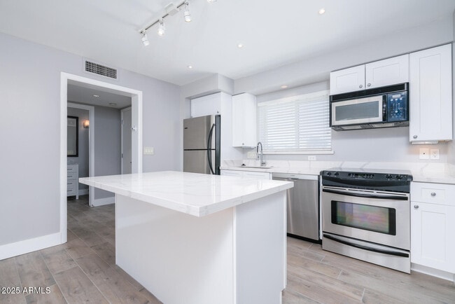 Photo - 7601 E 2nd St Unidad 6