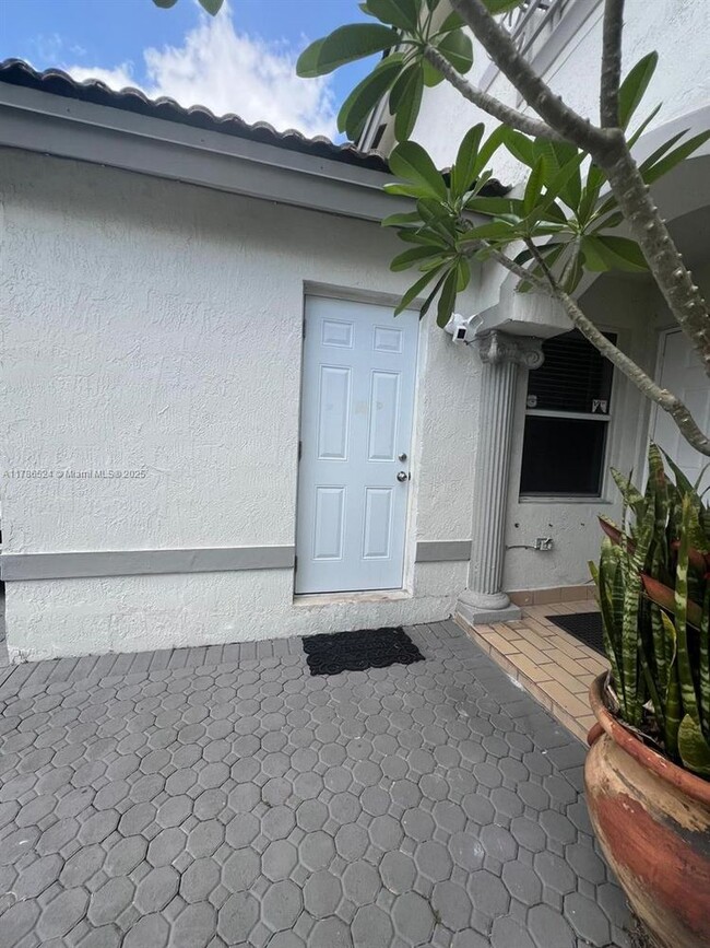 Building Photo - 15709 SW 90th Terrace Unit 9-9 Rental