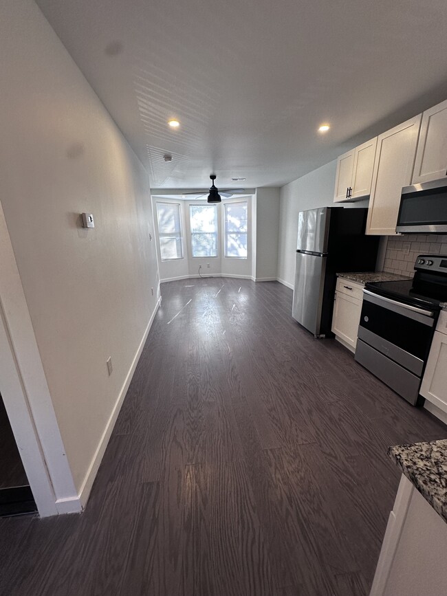 Kitchen living room - 1213 N 53rd St Apartments Unit B