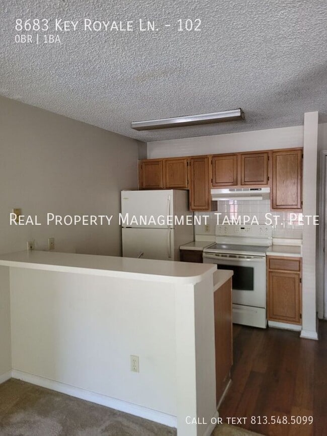 Photo - 8683 Key Royale Ln