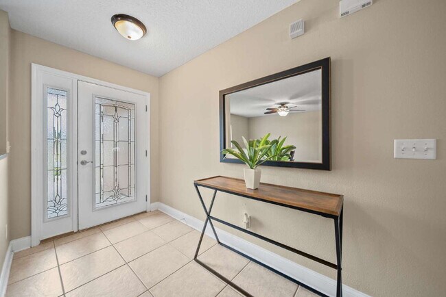 Photo - Luxurious Palm Coast Retreat: 4-Bed 3 Bath Pool Home