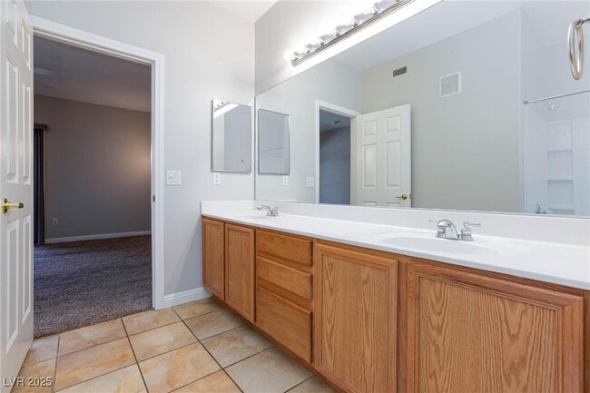 Building Photo - 9330 W Maule Ave Unit 208