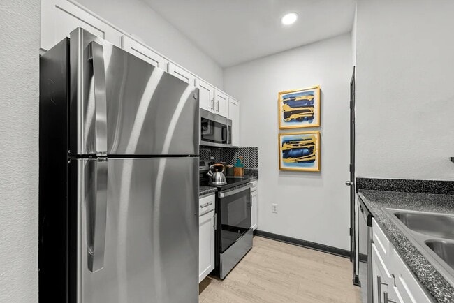Building Photo - 7828 Pat Booker Rd Unit 0129 Rental