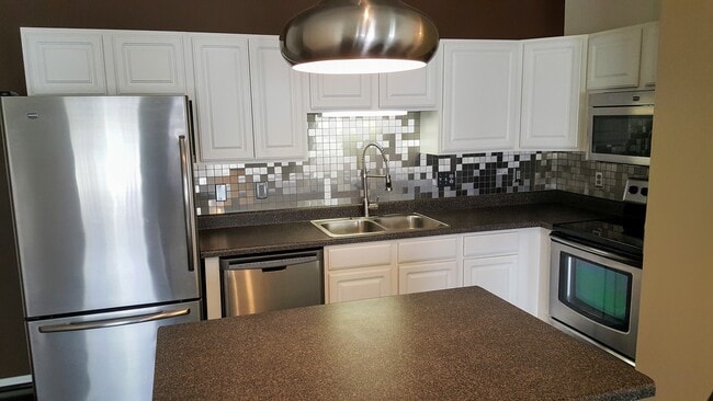 Photo - 1991 29th Pl NW Unit The Pines w/ Heated Garage