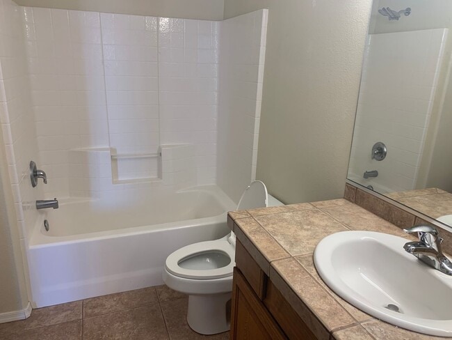 Photo - Spacious 3-Bedroom, 3-Bath Two-Story Home in a Gated Community with Lake Views and Poolside Location