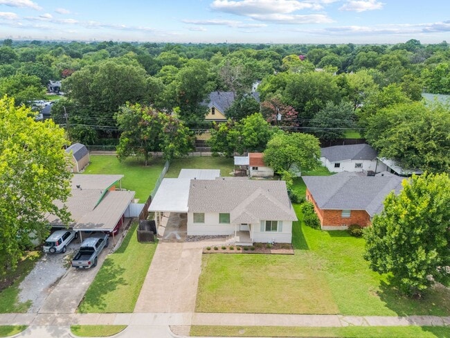 Photo - **$40K+ IN UPGRADES AND A FENCED BACKYARD WITH TWO STORAGE BUILDINGS**