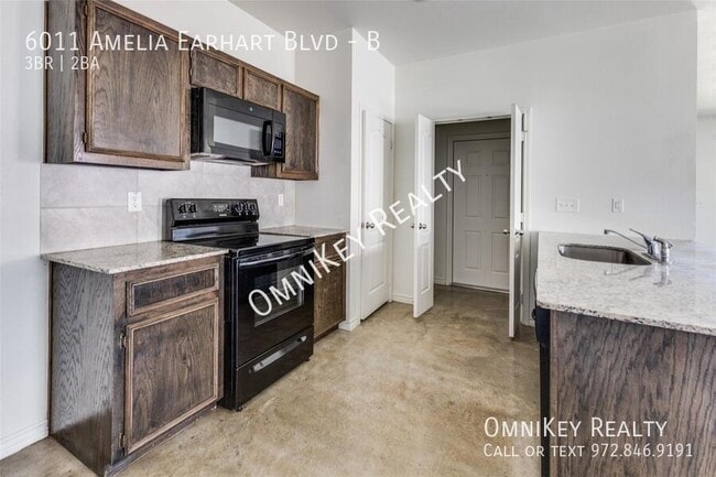 Photo - 6011 Amelia Earhart Blvd Unit B
