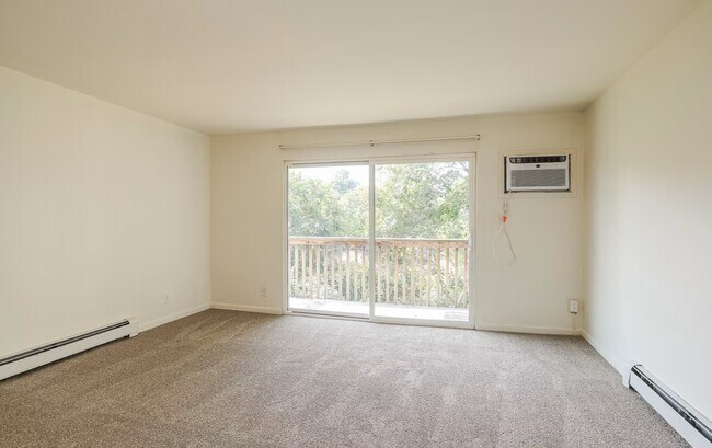 Living Area, and private balcony access.