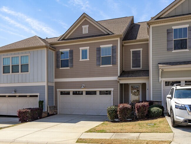 Photo - **MOVE IN SPECIAL! 50% off first month's rent!!** Spacious 4BR Townhouse with 2-Car Garage Near D...