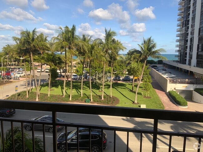 Building Photo - 6444 Collins Ave Unit 302 Rental