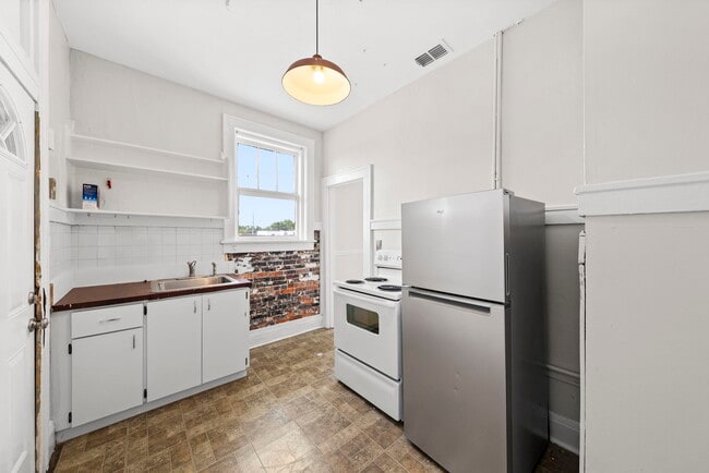 Building Photo - 4713 N Florida Ave Unit E Rental