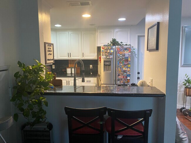 Photo - 9601 Woodman Ave Unit 2