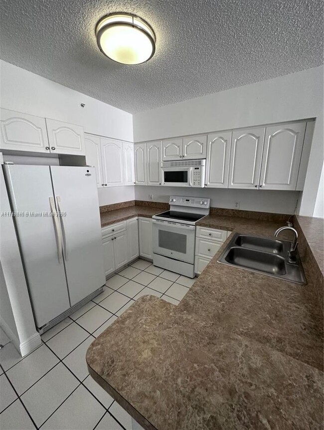 Building Photo - 5091 NW 7th St Unit 1015-1015 Rental