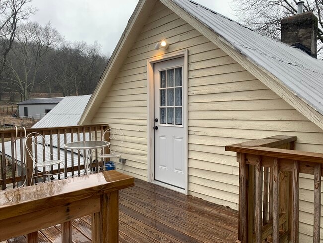 Top of stairs onto deck, with access to front door to studio - 135 Lock Seven Ln