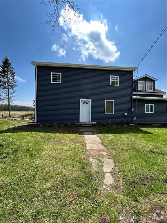 Building Photo - 9661 W Ridge Rd Rental