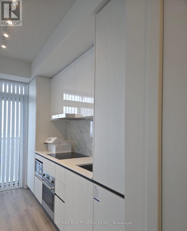 Photo - 8 Interchange Wy Unit 2006