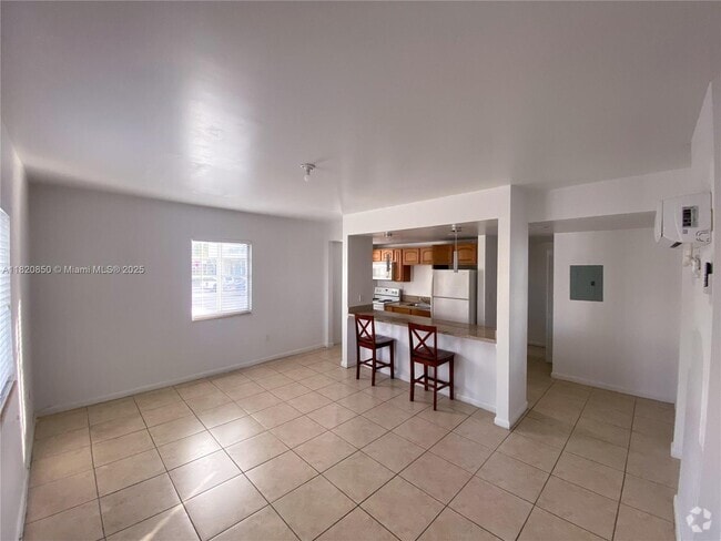 Building Photo - 7130 Rue Versailles Dr Unit 11 Rental
