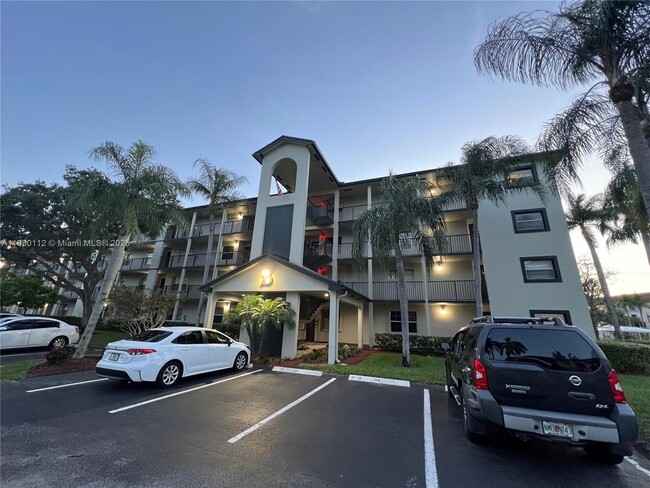 Building Photo - 12950 SW 13th St Unit 409D Rental