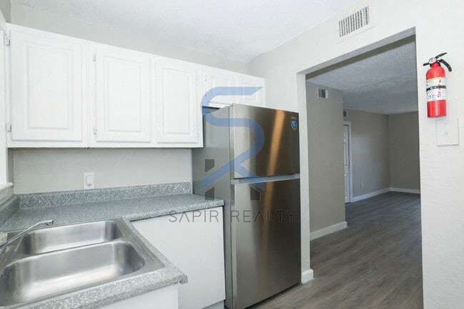 Photo - Freshly Updated 2BR/1.5BA with All-Electric Living Unit 8