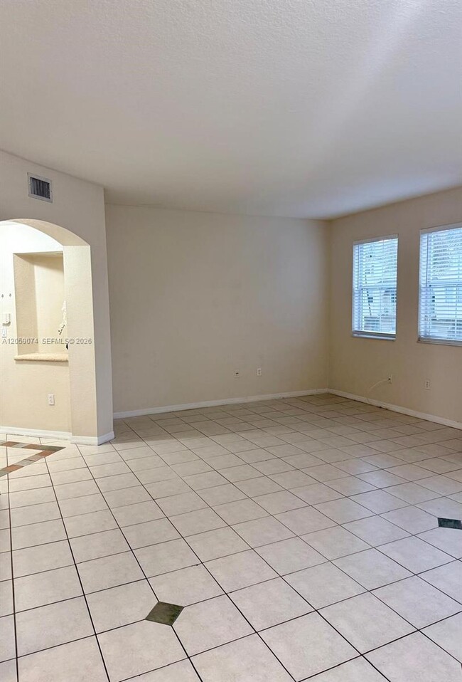 Building Photo - 8906 W Flagler St Unit 216