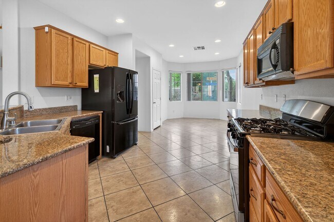 Photo - CORNER LOT 4-BEDROOM HOME + LOFT WITH 3.5 BATHS AND 3-CAR GARAGE!
