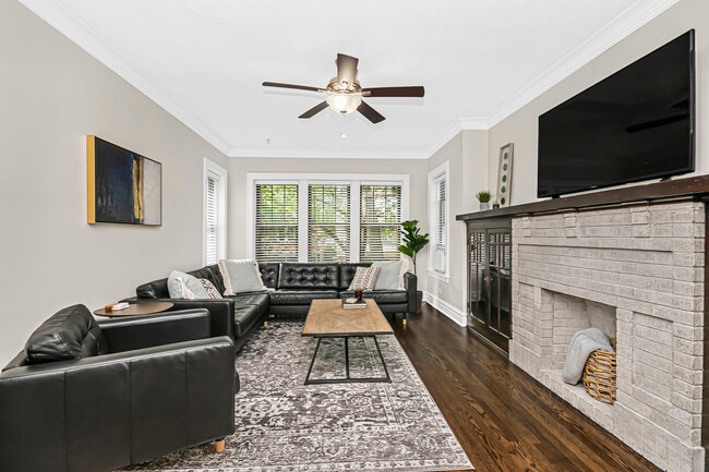 Living Room with original built-in bookcase & fireplace. - 2460 W Cullom Ave Unit #2